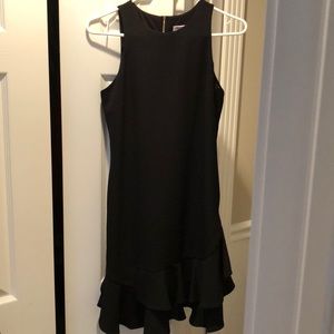 Perfect black dress with ruffle at bottom